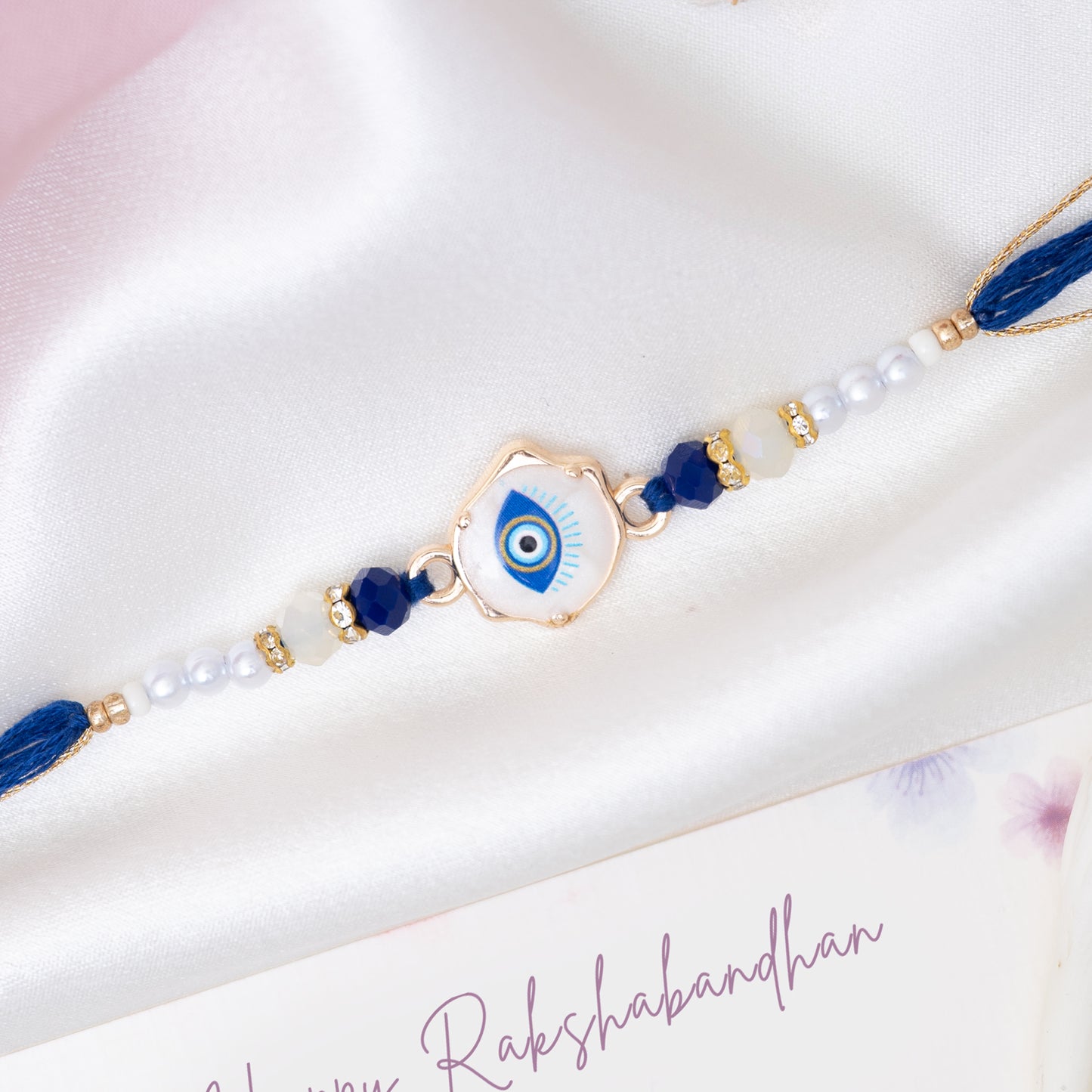 Royal Blue Evil Eye Marble Rakhi With Pearls With Roli Chawal Set