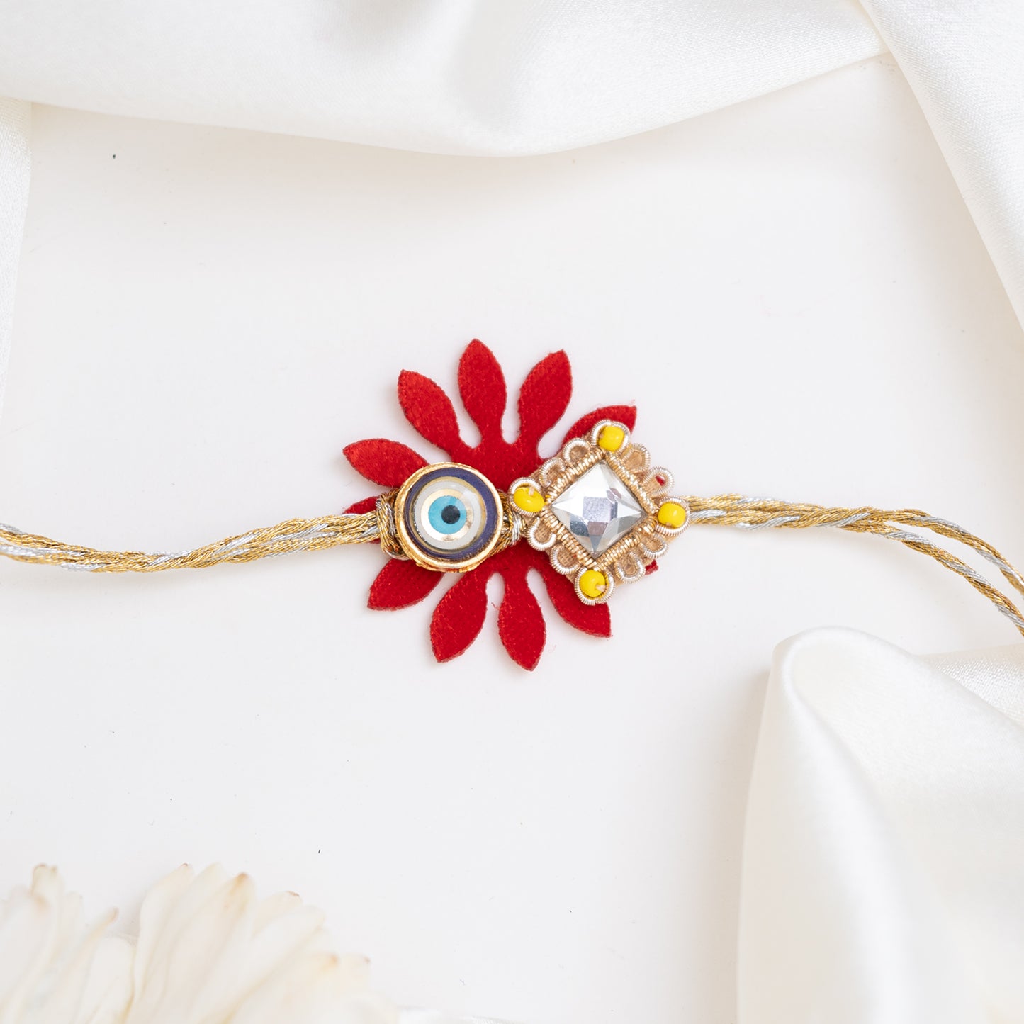 Red Leafy Diamond Cut Evil Eye Rakhi With Rol Chawal Set