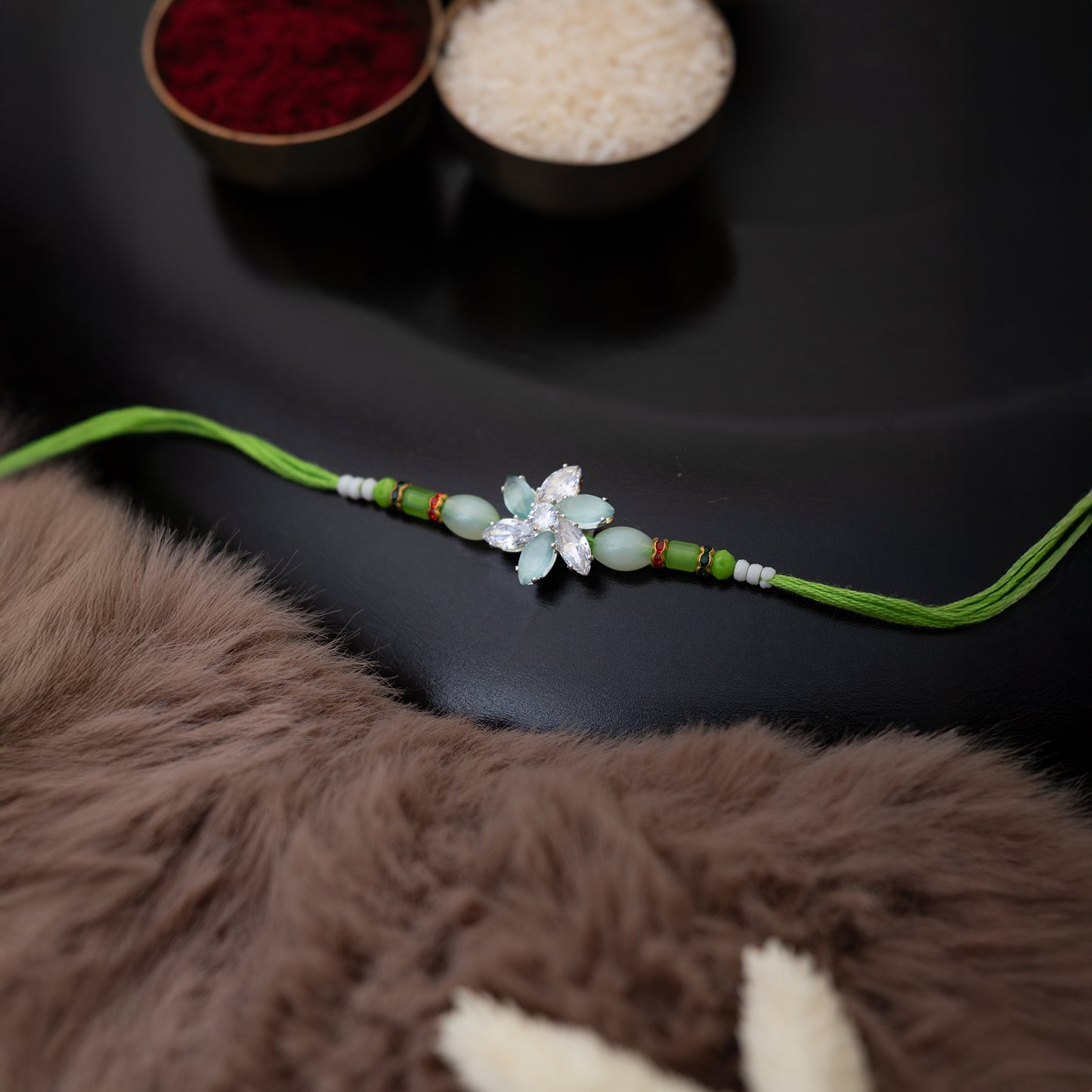 Crystal Blossom Rakhi. Set of 2 With Roli Chawal Set