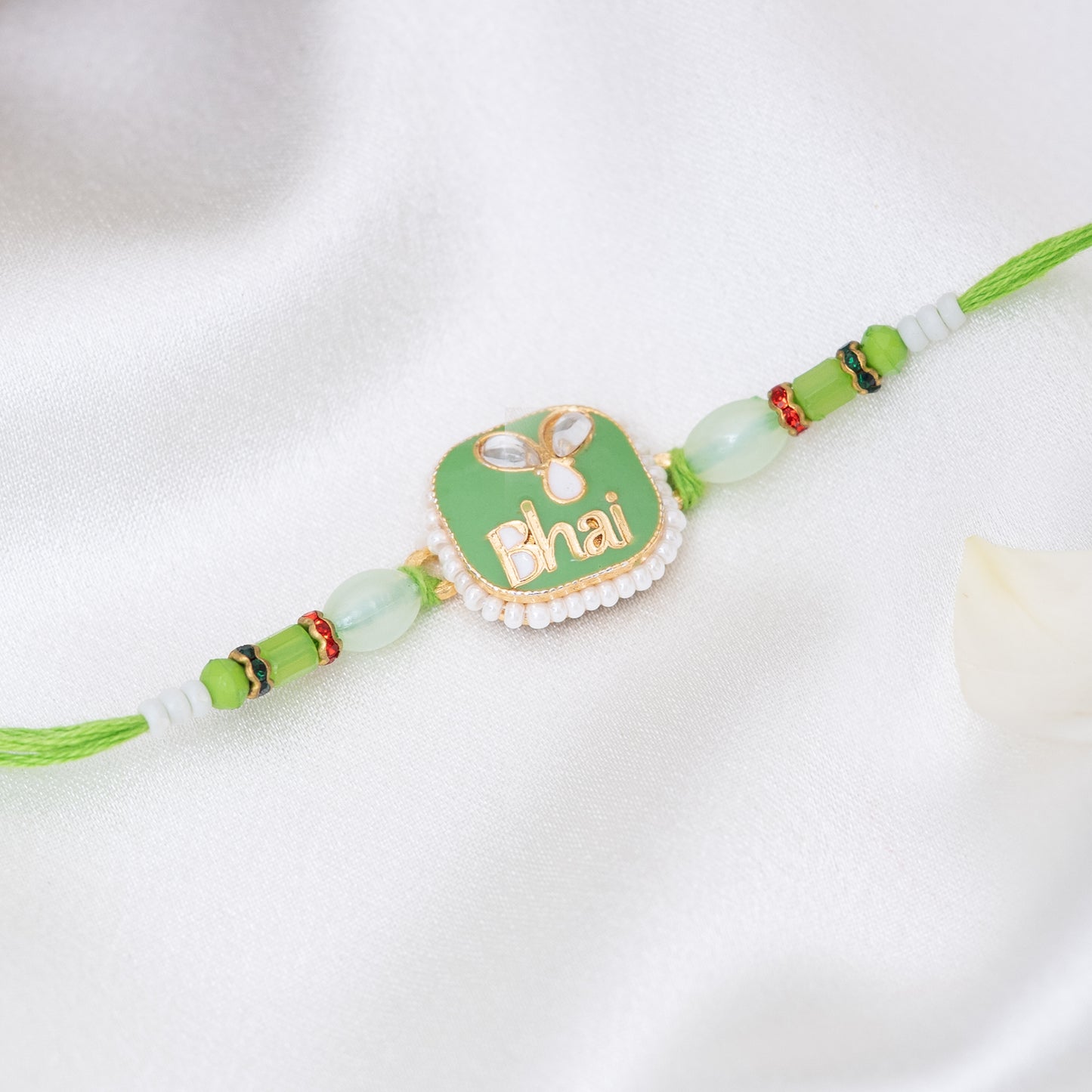 Engraved Bhai Rakhi in Green with Pearls with Roli Chawal Set