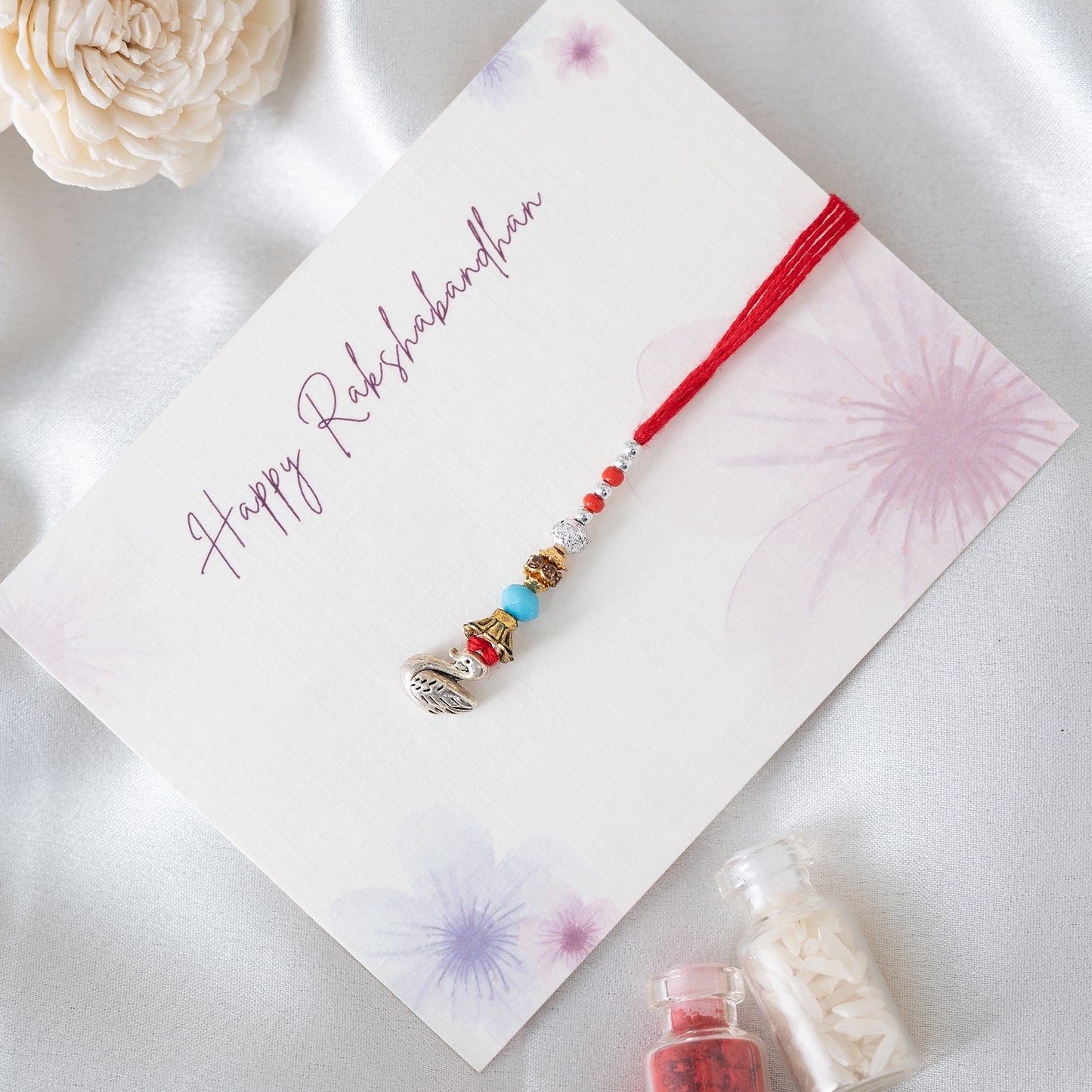 Minimal Swan Charm Lumba With Roli Chawal Set