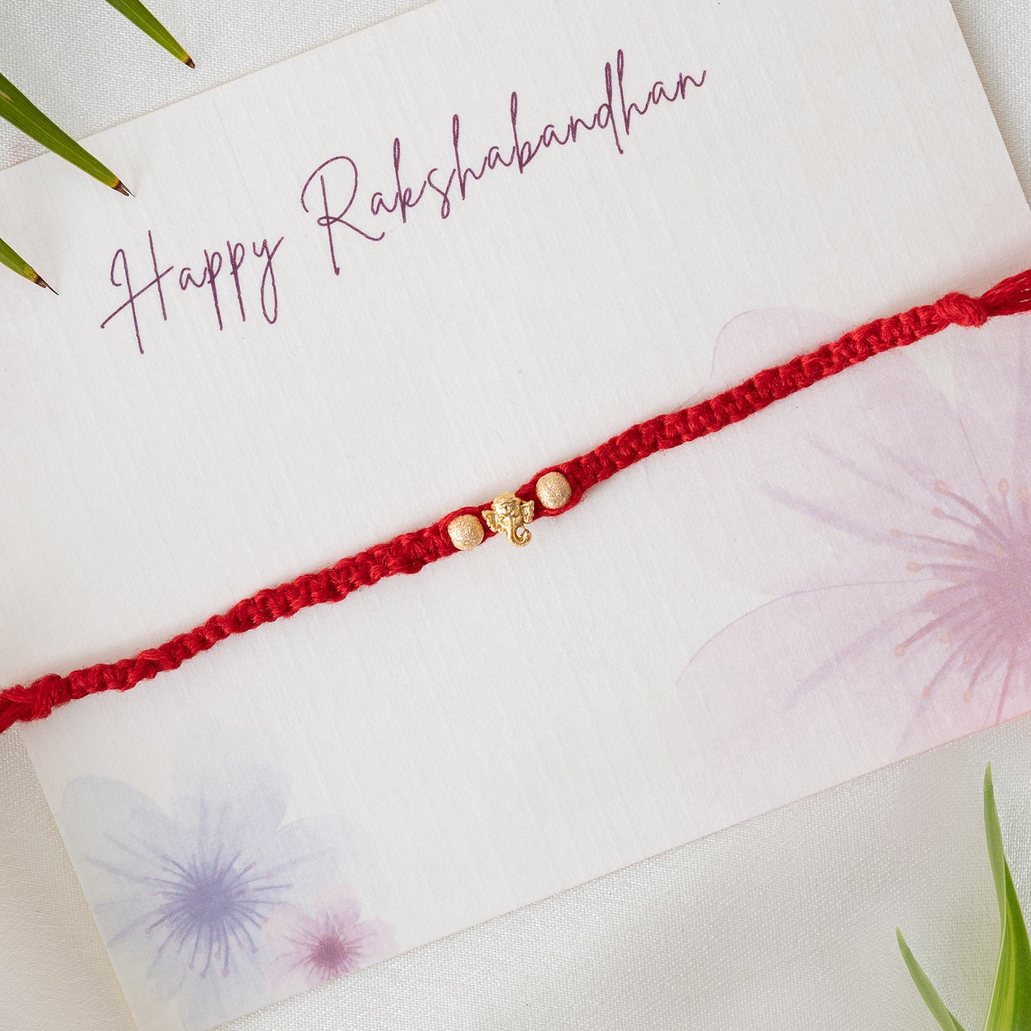 Mini Ganesha Charm Bhai rakhi Set of 3 With Roli Chawal Set