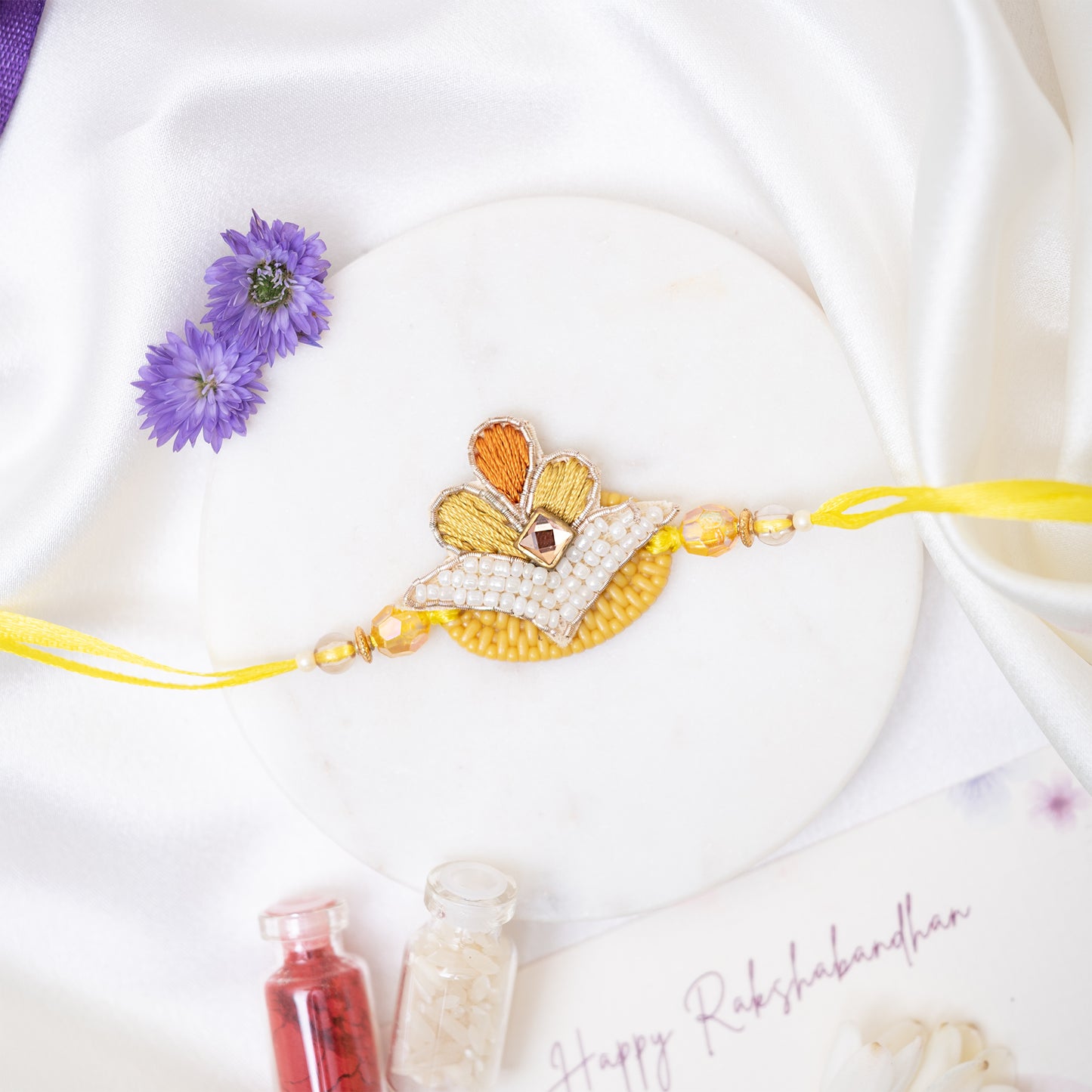 Handcrafted Flower Pearl Rakhi wth Roli Chawal Set