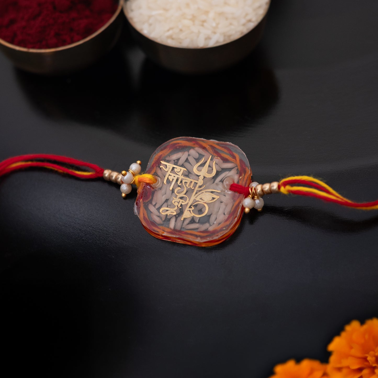 Mauli Rice Jai Mata Di Resin rakhi with set of Roli Chawal