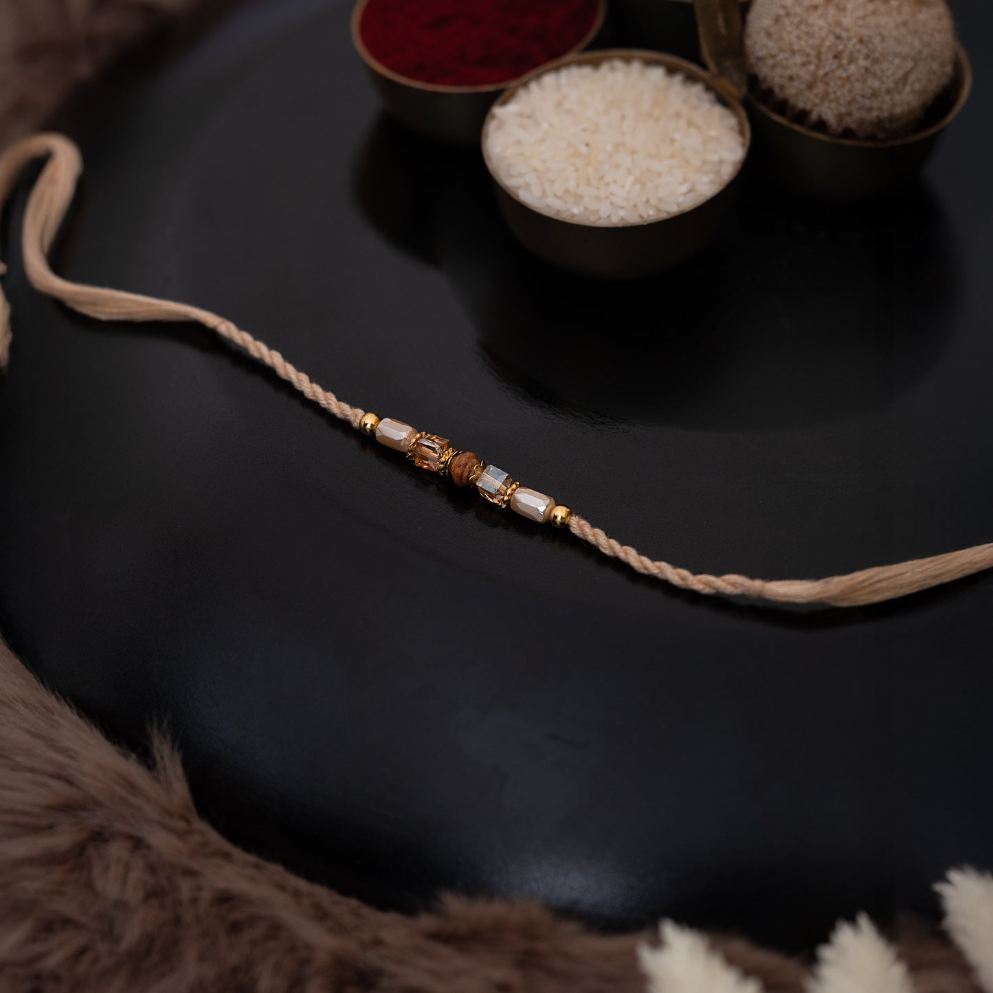 Chic Crystal Rakhi for Bhai with set of roli chawal