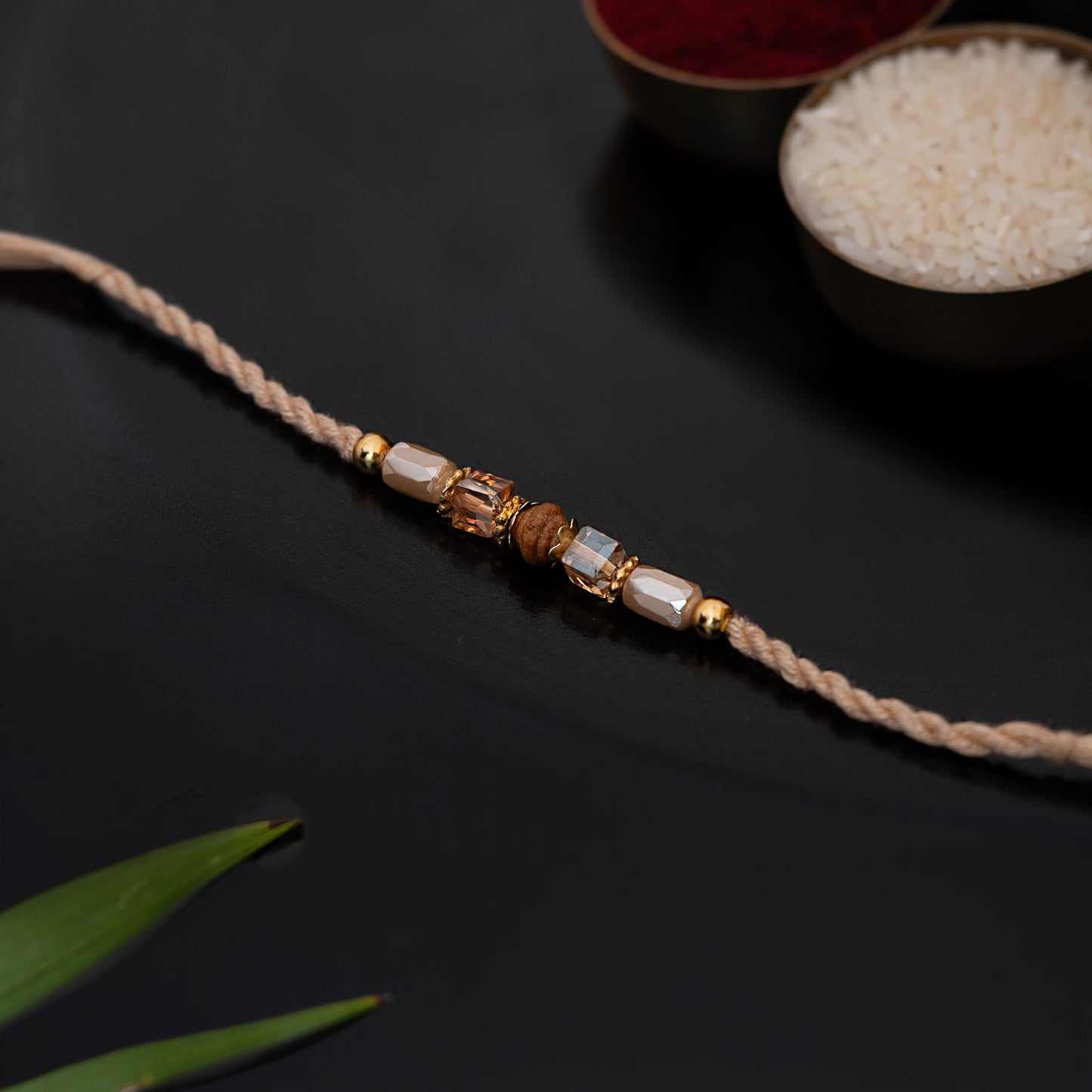 Chic Crystal Rakhi for Bhai with set of roli chawal