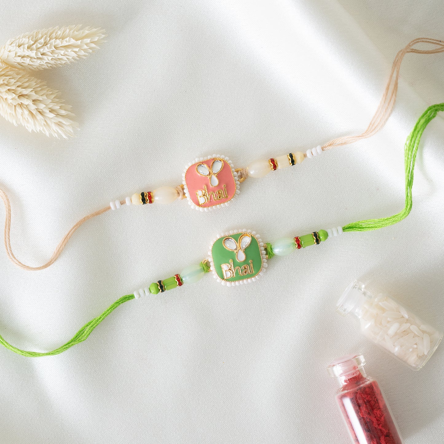 Bhai Rakhi Pair in Soft Peach & Green with Engraving With Roli Chawal Set