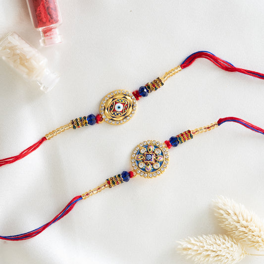 Stone Studded Metal Rakhi. Set of 2 With Roli Chawal Set