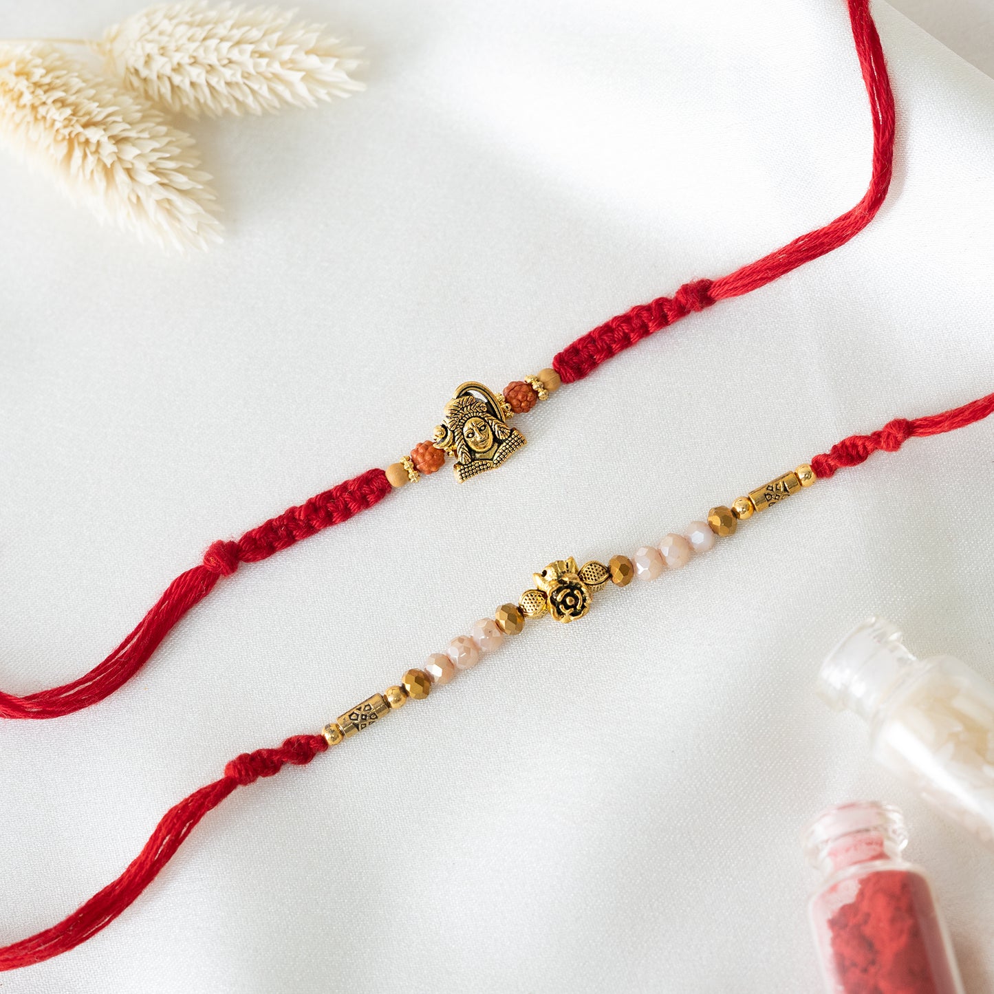 Antique Charm Rakhi. Set of 2 With Roli Chawal Set