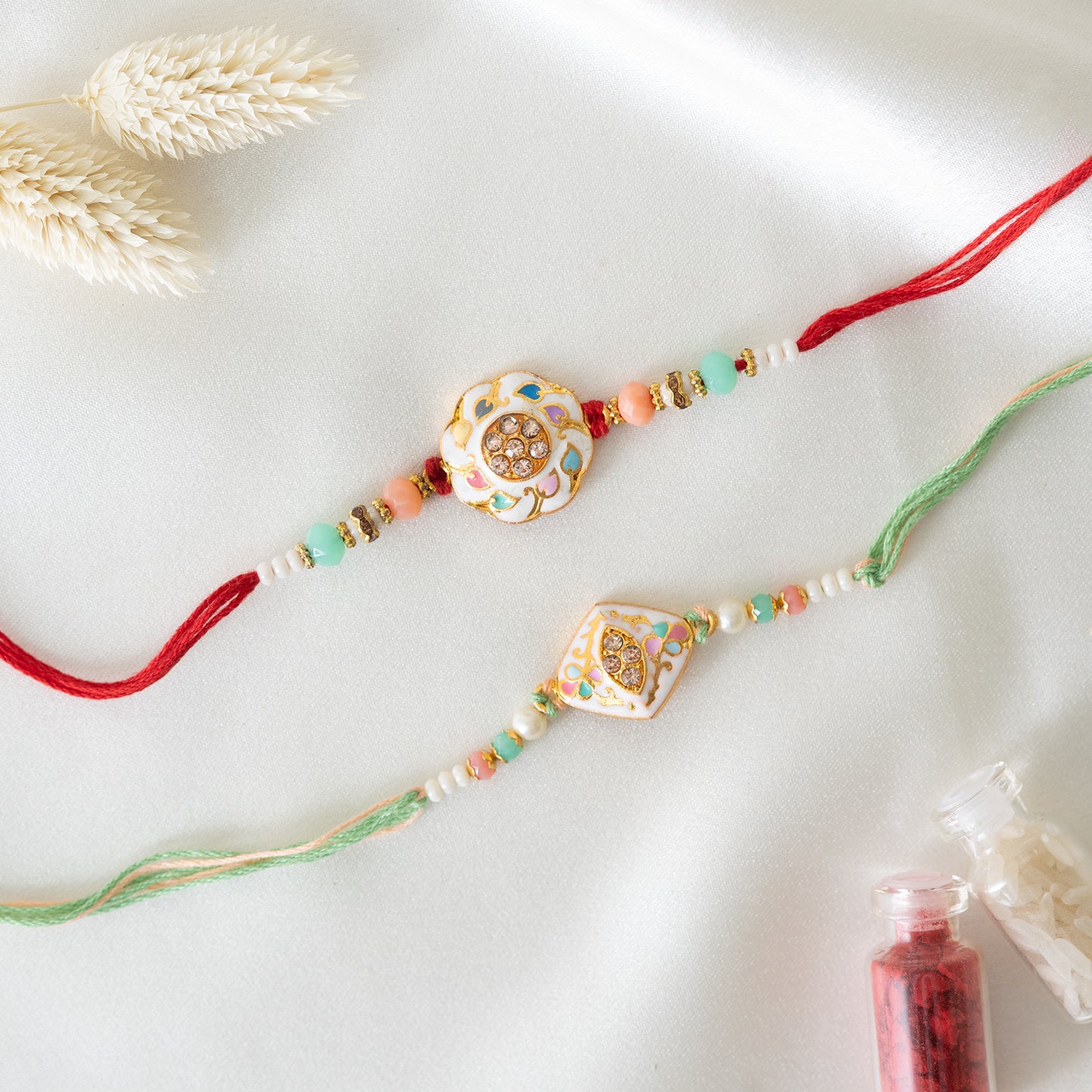 Traditional Karigari Rakhi. Set of 2 With Roli Chawal Set
