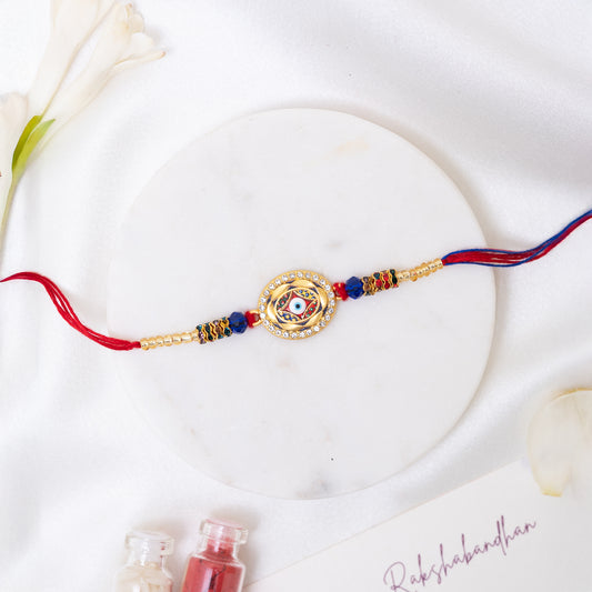 Stone-Studded Metal Evil Eye Rakhi With Roli Chawal Set
