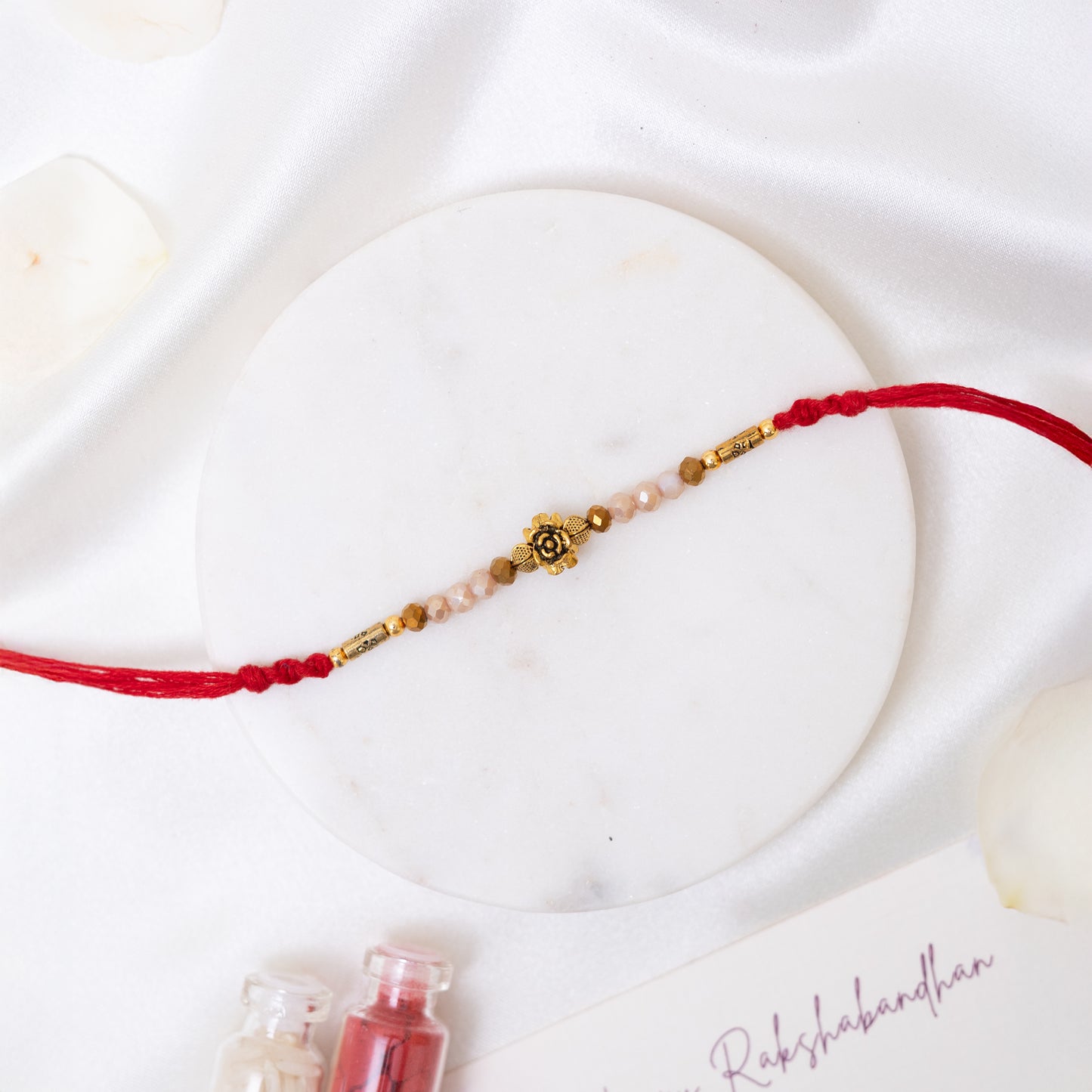 Antique Charm Rakhi. Set of 2 With Roli Chawal Set