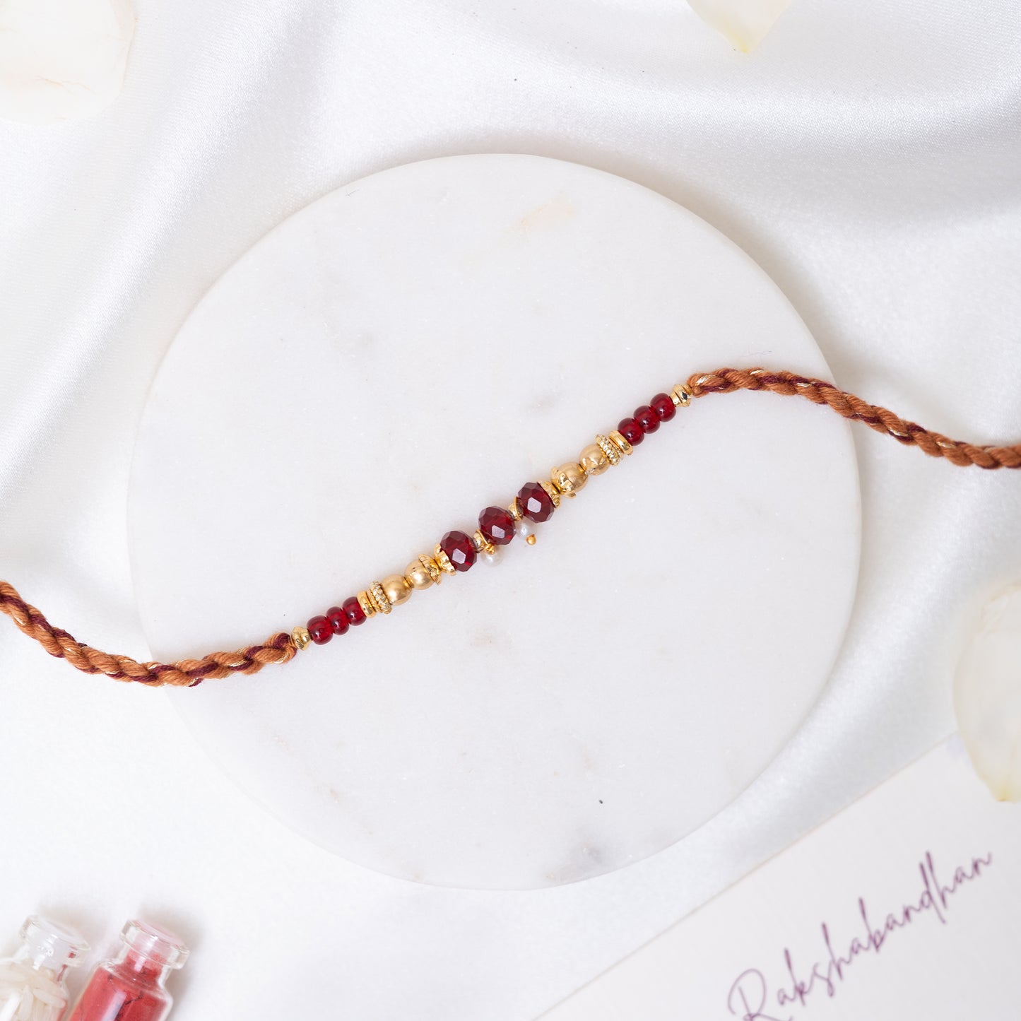 Set of 2 Red Beaded Rakhi With Roli Chawal Set