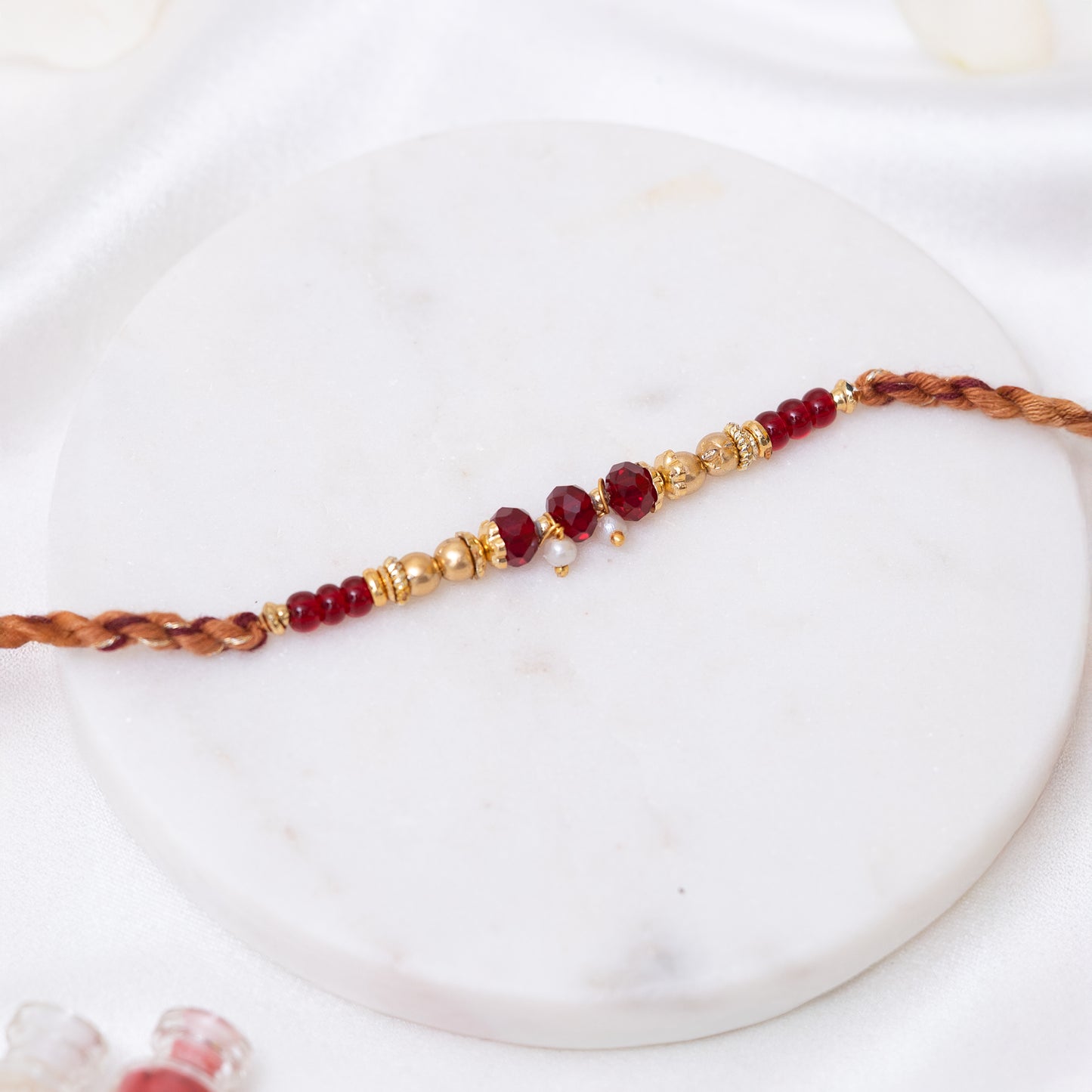 Set of 2 Red Beaded Rakhi With Roli Chawal Set