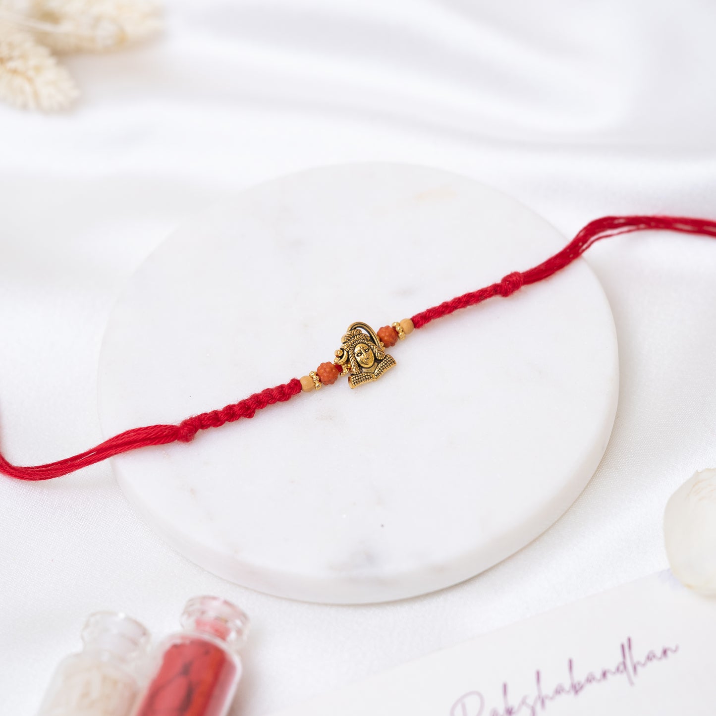 Antique Charm Rakhi. Set of 2 With Roli Chawal Set