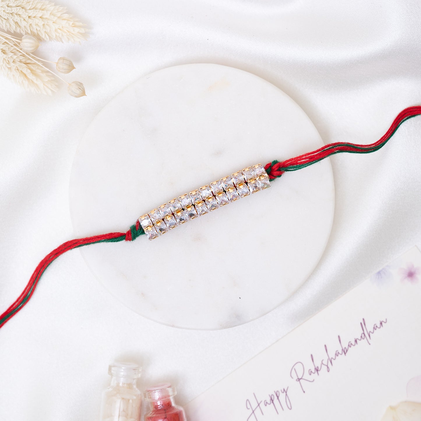 Tradition Trendy Rakhi. Set of 2 With Roli Chawal Set