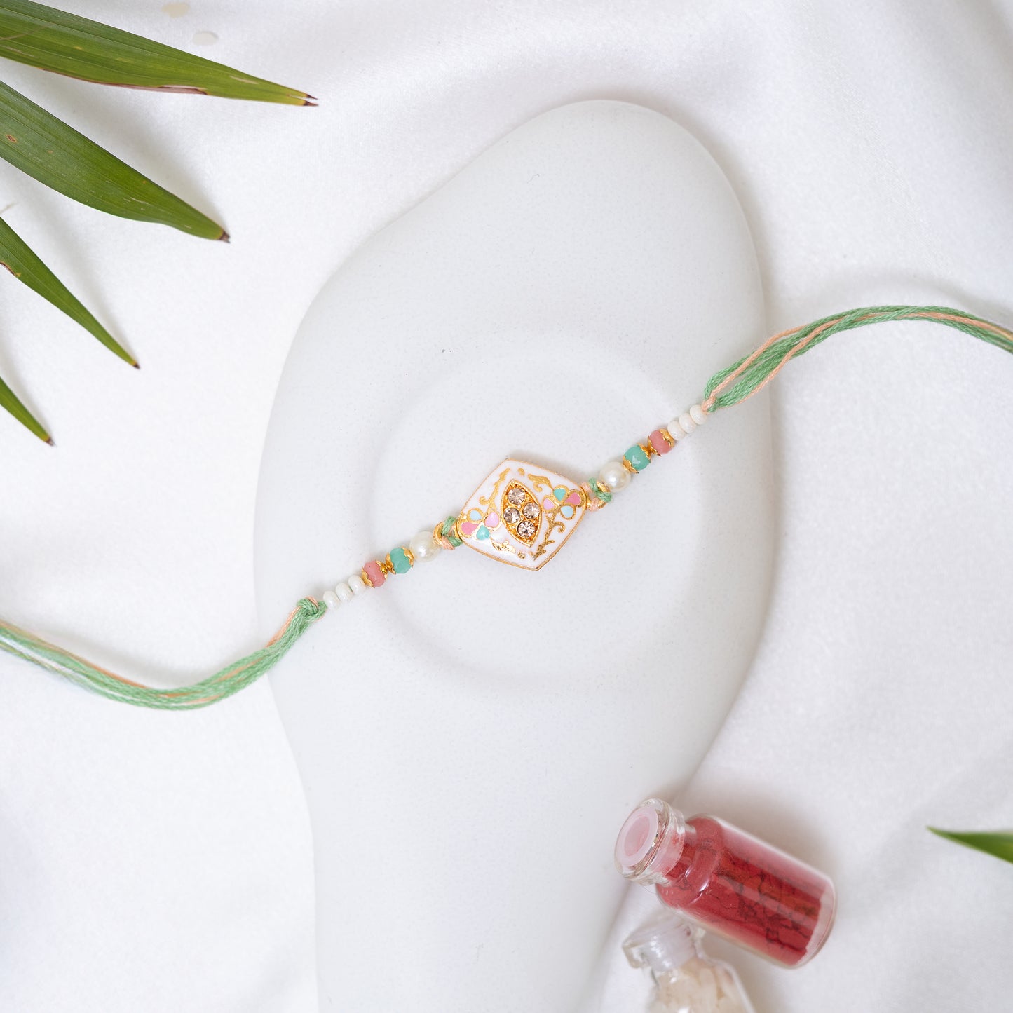 Traditional Karigari Rakhi. Set of 2 With Roli Chawal Set