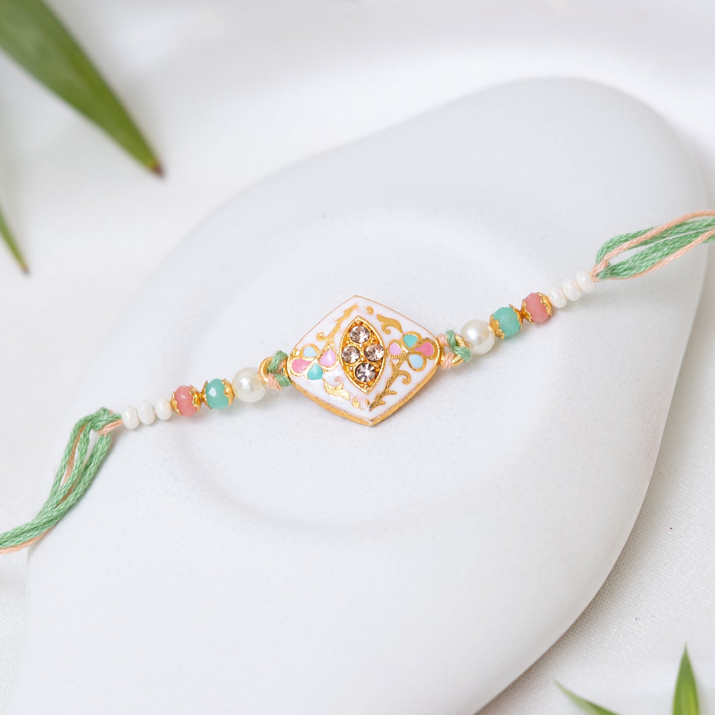 Traditional Karigari Rakhi. Set of 2 With Roli Chawal Set