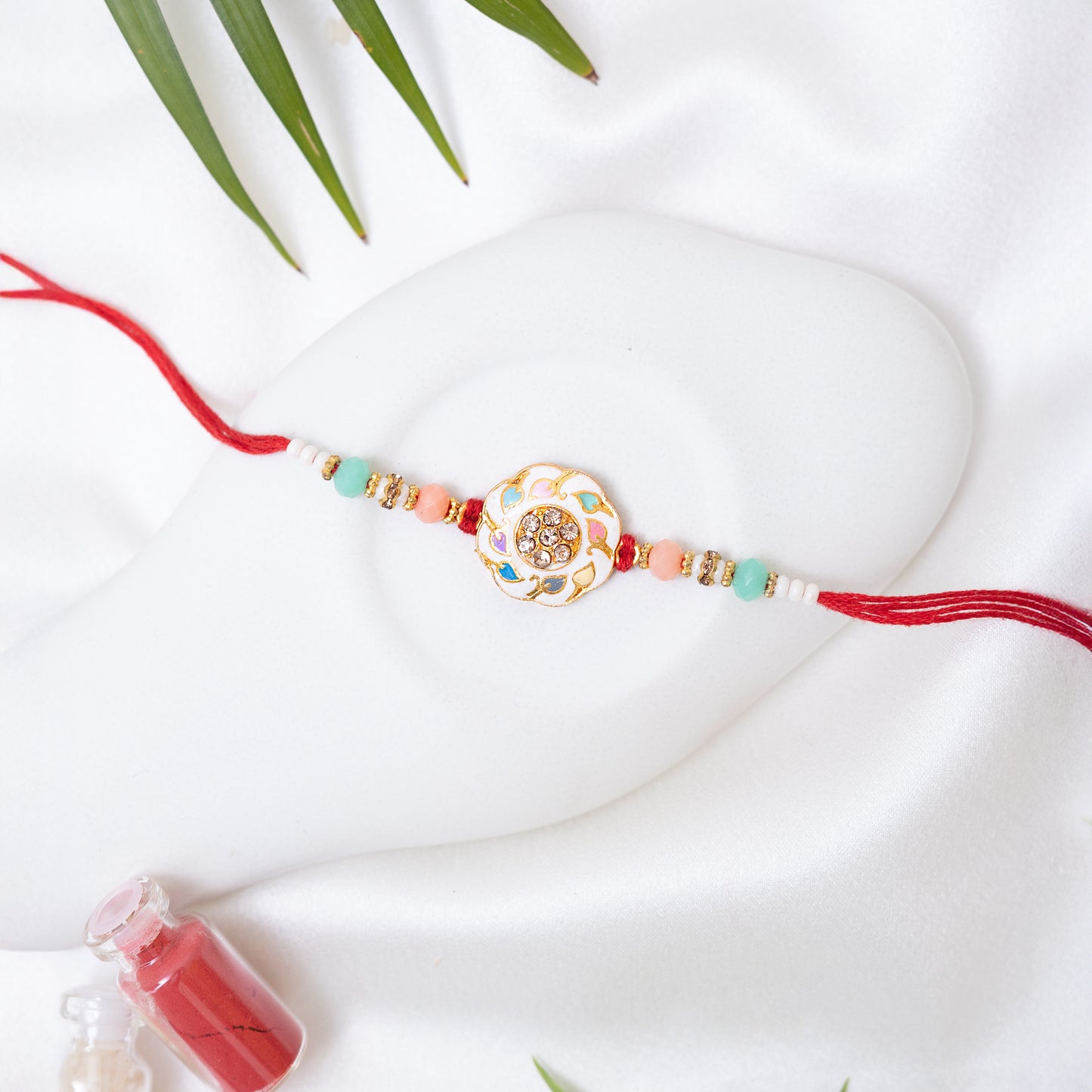 Traditional Karigari Rakhi. Set of 2 With Roli Chawal Set