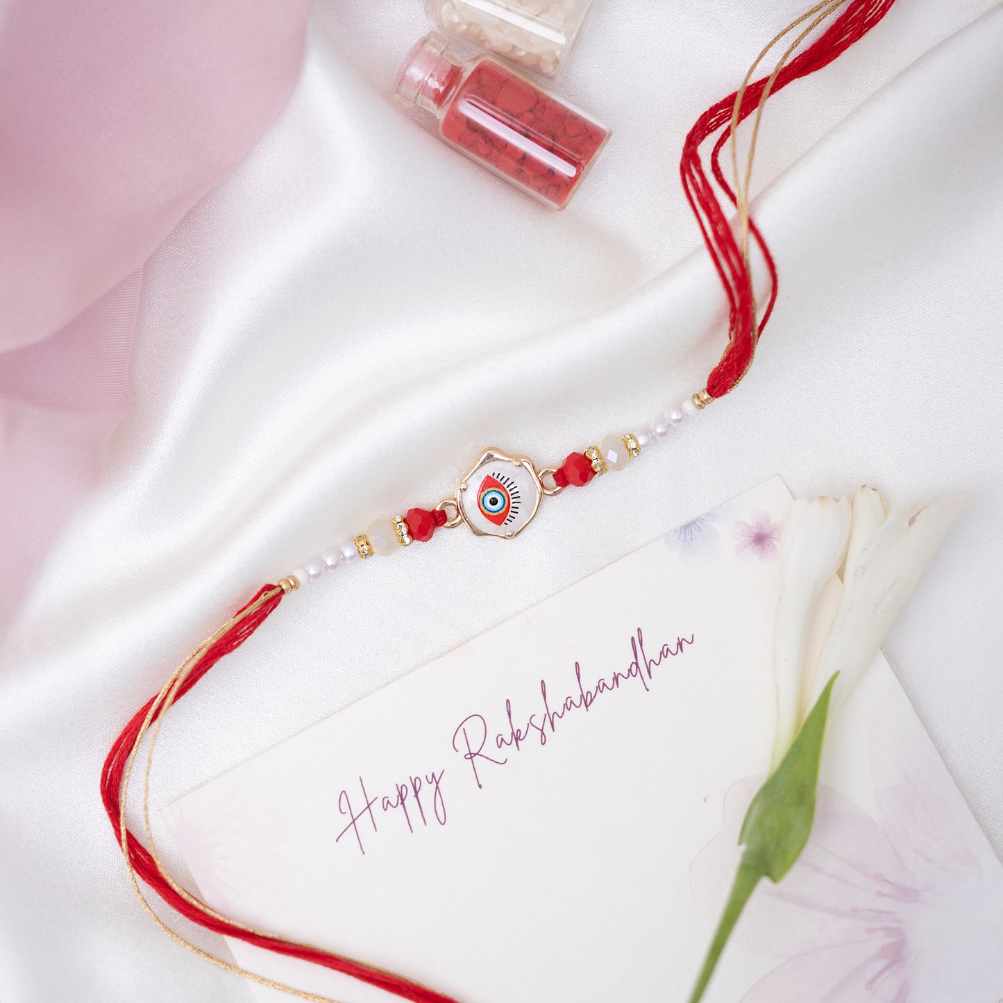 Evil Eye Marble Rakhi Set of 3 With Roli Chawal Set