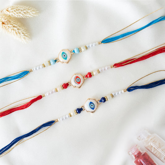 Evil Eye Marble Rakhi Set of 3 With Roli Chawal Set